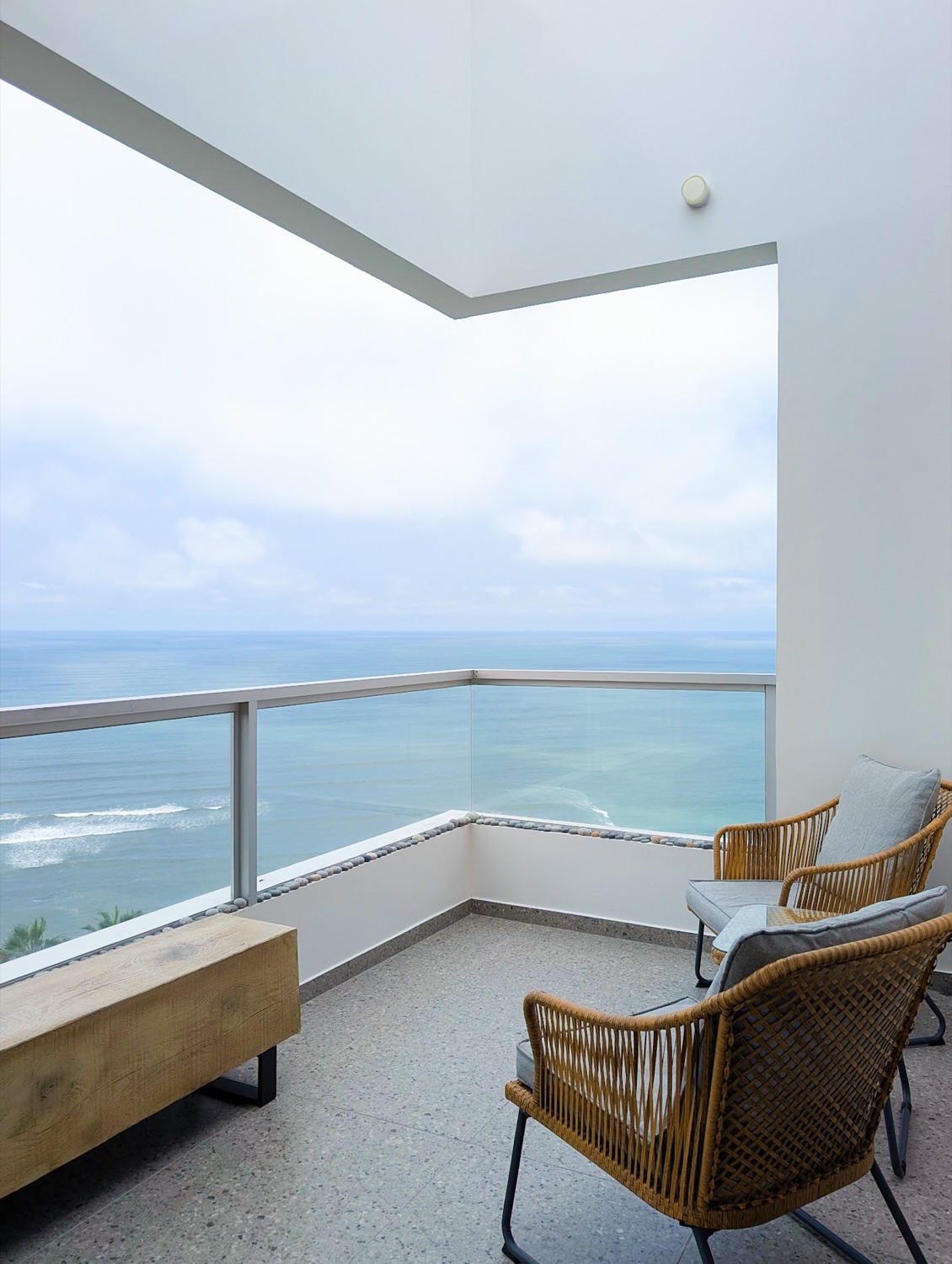 Corner balcony with the Pacific by day